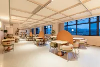 Orange Hotel (Zhaosu Tianma International Plaza Branch) - فطور