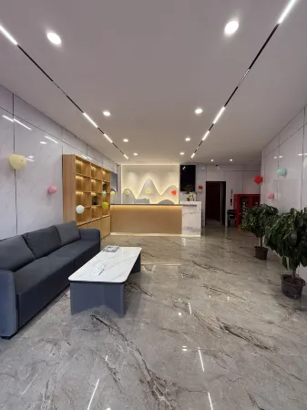 Huayi Business Hotel Отели в г. Бацинь