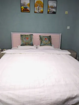 Xinzheng Yijia Hotel (Renmin Luxiasi College Branch)