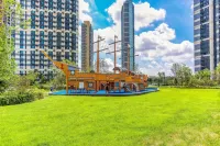 Yixiu Shanhai Scenic Apartment (Shanhai Square Vanke Lawei Coast)