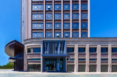 Home Inn (Kuche Pedestrian Street Branch) Отели рядом с достопримечательностью «Qingchengqiang Site»