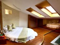 格盟酒店(三清山风景区店) - 榻榻米圆床房