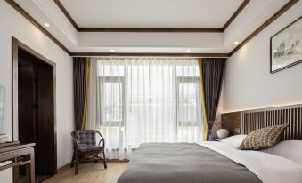 Floral Hotel· Wuyuan Huiyuge Hotel (Wuyuan High-speed Railway Station Shop)