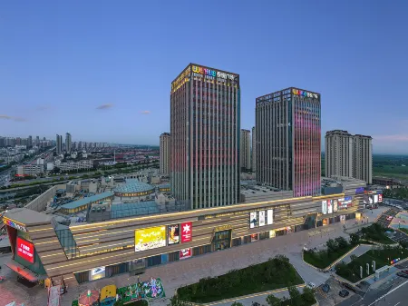 Vienna International Hotel (Tianjin Guozhan Wuyue Plaza) Отели рядом с достопримечательностью «Tianjin Occupation Skill Public Training Center Gymnasium»