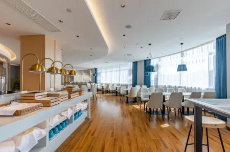 Junlai Hotel YUE (Cangzhou Gymnasium Branch) Отели рядом с достопримечательностью «Huazu Temple»