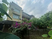 Hechi Menggu Inn - Homestays