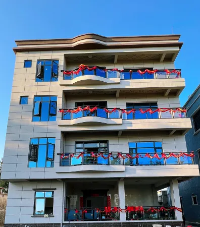 Naozhou Island Xingchen Yuhai Homestay Отели рядом с достопримечательностью «Naozhou Lighthouse»