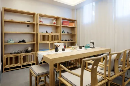 BUDDY HOTEL Отели в г. Уюань