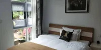 Manqing Huayu Holiday Villa - Sunshine Garden Room (tweepersoonsbed)