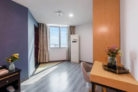 Haoting Business Hotel (Zhaoqing Duanzhou) Отели рядом с достопримечательностью «Qixingyan Archway Square»