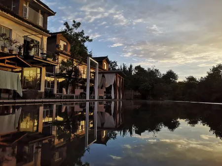 Mengli Homestay (Mianzhu Lanshan Chu) Отели в г. Мяньчжу