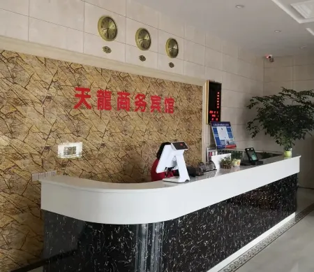 Tianlong Business Hotel (Zhengyang Runanbu) Отели в г. Чженян