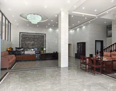 Xiuyuan Hotel Отели рядом с достопримечательностью «Глобальный автомобильный пассажирский станция Ляо Ляо»