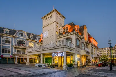 Dalian Fiveinn·5 Haisu Designer Homestay Отели рядом с достопримечательностью «Ши-Лу-Кунь»