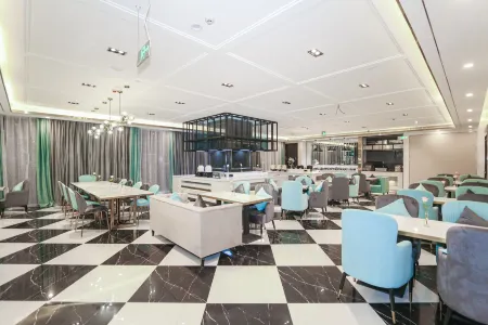 Xana Deluxe Hotel (Handan East Railway Station Meile City) Отели рядом с достопримечательностью «Yuanyuan College (West Campus)»