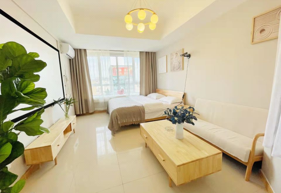 Wanda Gold Dragon Holiday Apartment - Housity