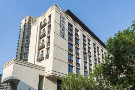 Jianguo Puyin Hotel (Xi'an Big Wild Goose Pagoda University of Technology  Subway Station Branch) Отели рядом с достопримечательностью «Xi'an University of Technology (West Area)»