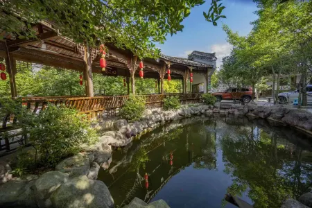 Pengzhou Longhuai Hotel Отели рядом с достопримечательностью «Danjing Mountain»