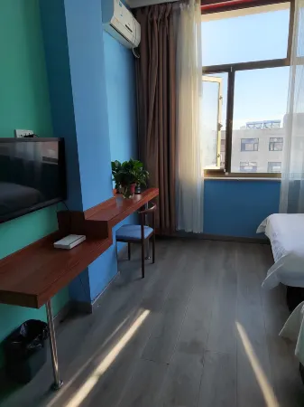 Dingbian Film Hotel Отели в г. Динбянь