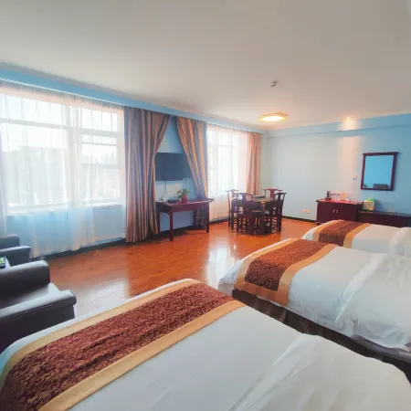 Oupai Jindi Grand Hotel (Xinyang International Trade City East Railway Station)