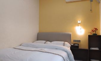 Aihaomei Self-Service Hotel (Lingang Equipment City Guanshan Yue)