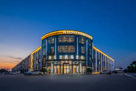 Helezhan Airport Hotel (Qingdao Jiaodong International Airport) Отели рядом со станцией Qingdaojichang Railway Station