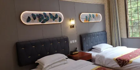 Kangding Spring Xinquanyi Villa Отели в г. Кандин