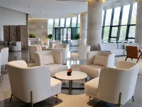 Pinghu Dingren Ramada Hotel Hotéis em Pinghu