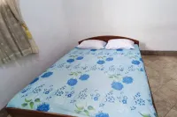 Spot on 93527 Agus Kostel Syariah Hotels in Dawe
