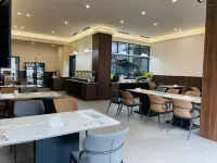 Pu'er River Hotel - Desayuno