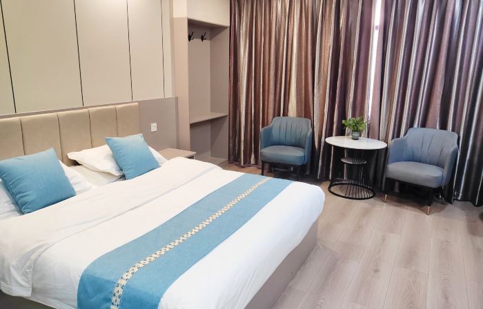 Qiqi Hotel (Longnan High-Speed Railway Station First People's Hospital)