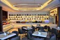 โรงแรมโฮมอินน์ พลัส (สถานีรถไฟ ถนนคนเดินตงไห่)