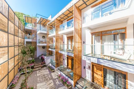 Xujiu Jinseli Hostel Отели рядом с достопримечательностью «Yongningtu Zhifu»