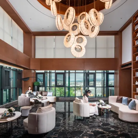 Pu'er SANMON Hotel (Yuecheng Shiguangli Shopping Park Shop)