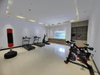 Shankee Tea Style Hotel (Xinyang Gushi Liaocheng Avenue) - Gym