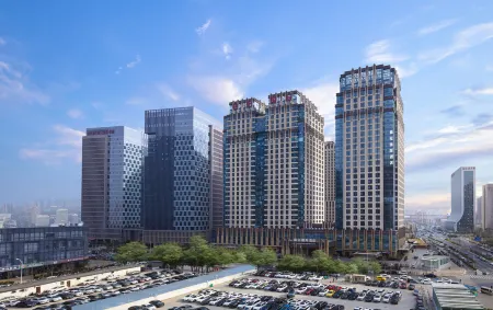 Zhengzhou East Railway Station E-unit  International Hotel Отели рядом с достопримечательностью «Zhengzhou Daxiang Taoci Museum»