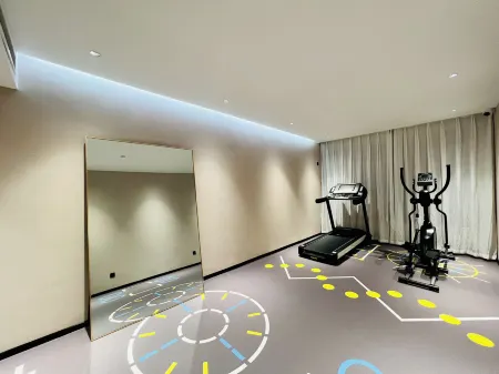 IU Hotel (Luoyang Yanshi Shangdu Road) Отели рядом с достопримечательностью «Yanshi Museum»