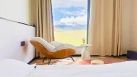 Xueyu Qishe · Scenic View Villa Hotel (Kangding Tagong Grassland Branch) - balcony