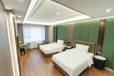 Ruifeng Xiangtai Hotel (Wanda Plaza) Отели рядом со станцией Shihezi Railway Station