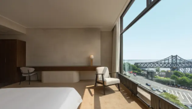 Tian Yu An Art Hotel（Dan Dong Train Station Ya Lu River Bridge) ） Отели в г. 