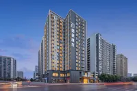 Zee Hotel Hotels in A red building/Pleasure City business district