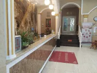 Xingshan Luoma Holiday Hotel