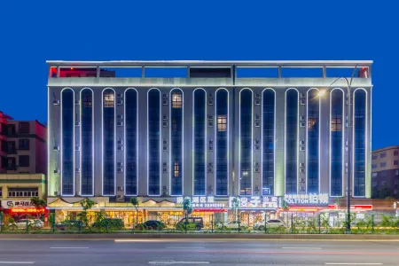 Xin Bo  International Apartment Zhongshan Xiaolan Taifeng Branch Отели рядом с достопримечательностью «Xiaolangang International Huogui Shipside»