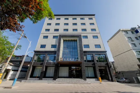 Ease Hotel (Tongchuan Wenying West Road Yaozhou Central Plaza) Отели в г. Тунчуань