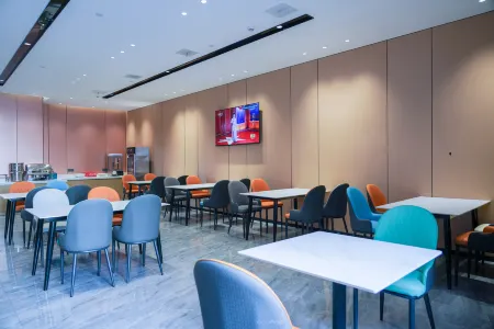 New beacon Shangju Hotel (Hannan Shamao Metro Station) Отели рядом с достопримечательностью «Hubei Land Resources Vocational College»