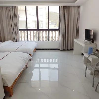 Luoping Caihuacun Inn โรงแรมใกล้จินจิลิง