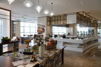Howard Johnson Great Eagle Plaza Aksu - فطور