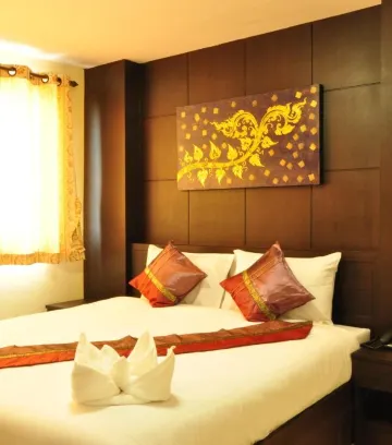 ห้องเตียงใหญ่ซูพีเรียพร้อมบริการรถรับส่งสนามบิน