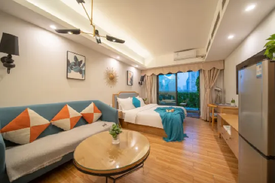 อพาร์ตเมนต์ นานาชาติซิงลุน (ทัวร์กลางคืนแม่น้ำจูเจียง ถนนคนเดินปักกิ่ง กว่างโจว)