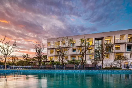 Orieco Club Aurora Hotel(Zhangjiagang Branch) Отели рядом с достопримечательностью «xiangshansi»